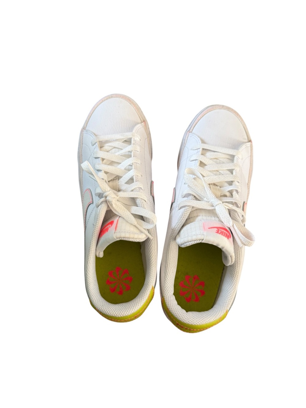 Nike White Low-Top Sneakers with Pink Swoosh and Yellow Heel